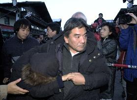 Families of Japanese train-fire victims arrive in Austria